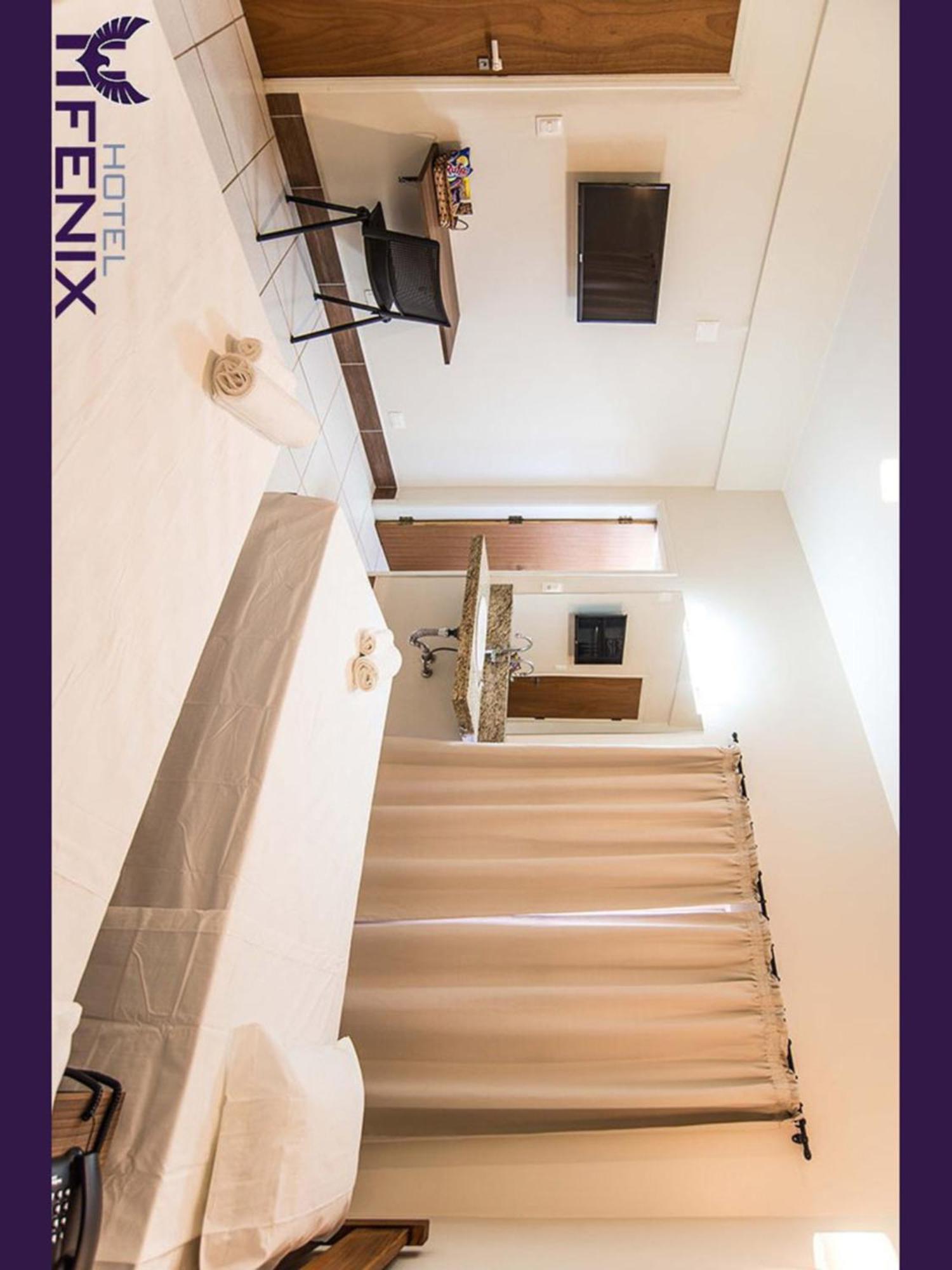 Hotel Fenix Асис Экстерьер фото